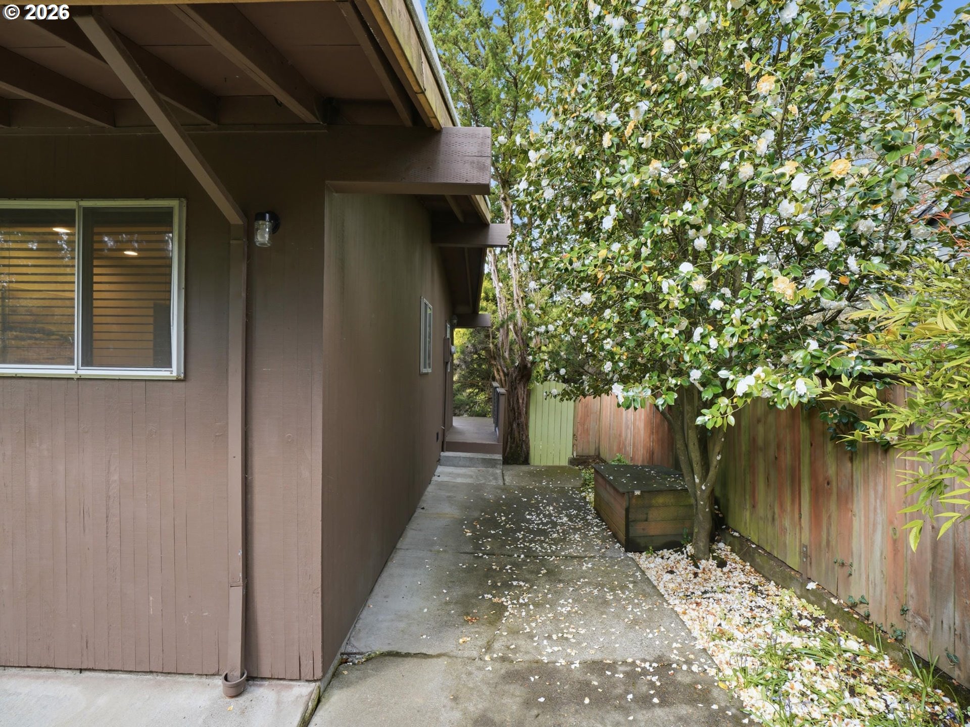 4148 Southwest 43rd Avenue Portland, OR 97221 - Photo 35 of 44 a view of a pathway of a house with a tree