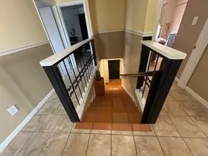 a kitchen with a sink a stove top oven and cabinets