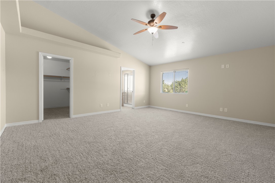 8755 Lilac Road Oak Hills, CA 92344 - Photo 18 of 28 a view of an empty room with a window