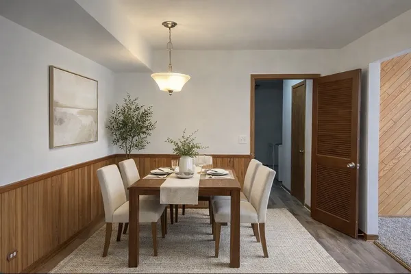 a view of empty room with a fireplace and fan