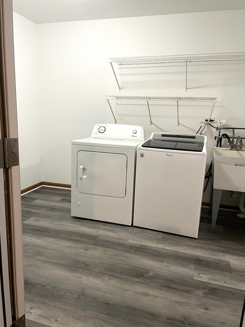 1740 Cumberland Road Aurora, IL 60504 - Photo 35 of 37 a utility room with dryer and washer