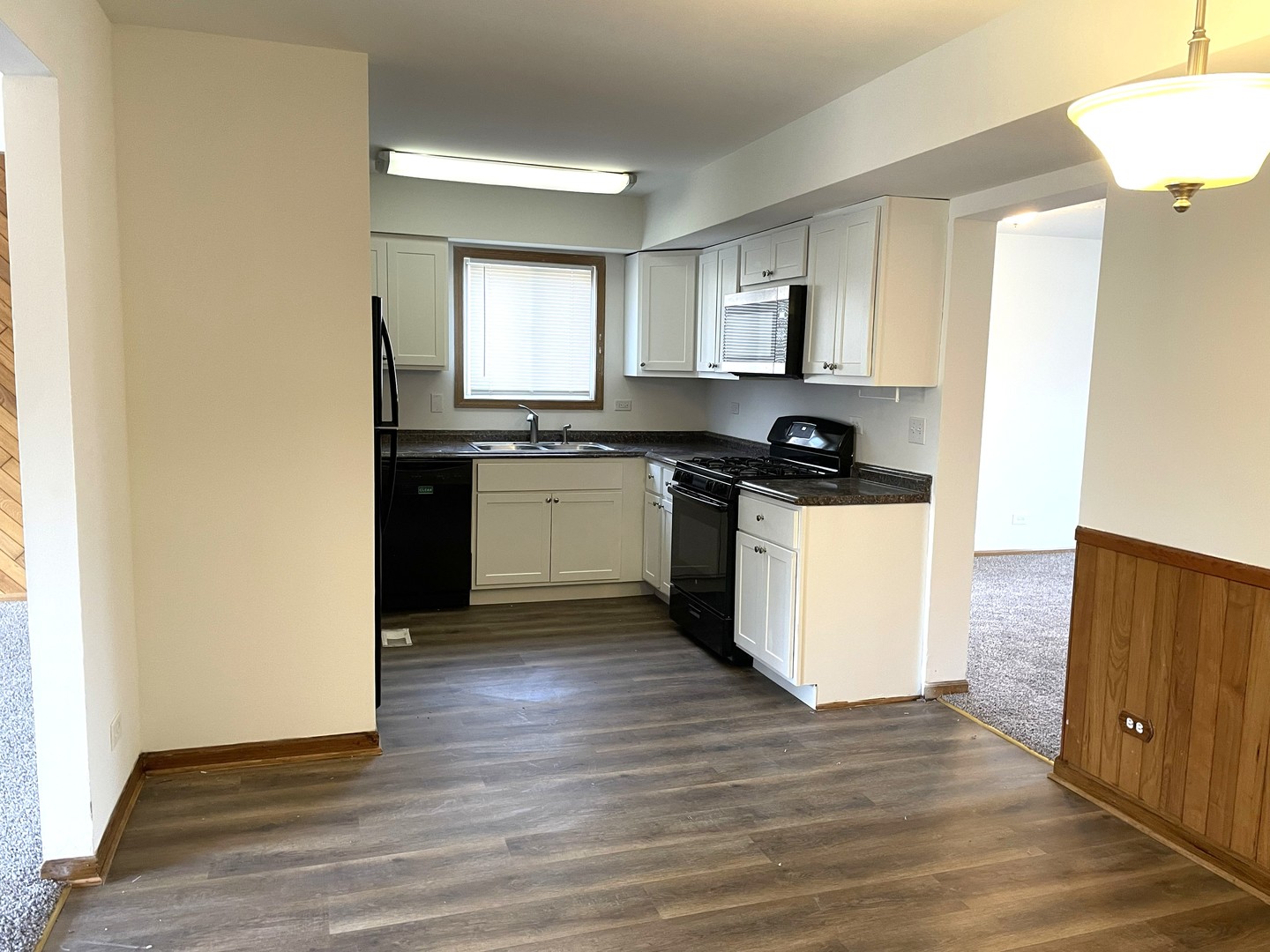 1740 Cumberland Road Aurora, IL 60504 - Photo 5 of 37 a kitchen with stainless steel appliances granite countertop a stove top oven and sink