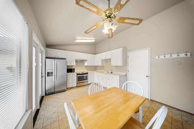 a bed room with a bed furniture and a window