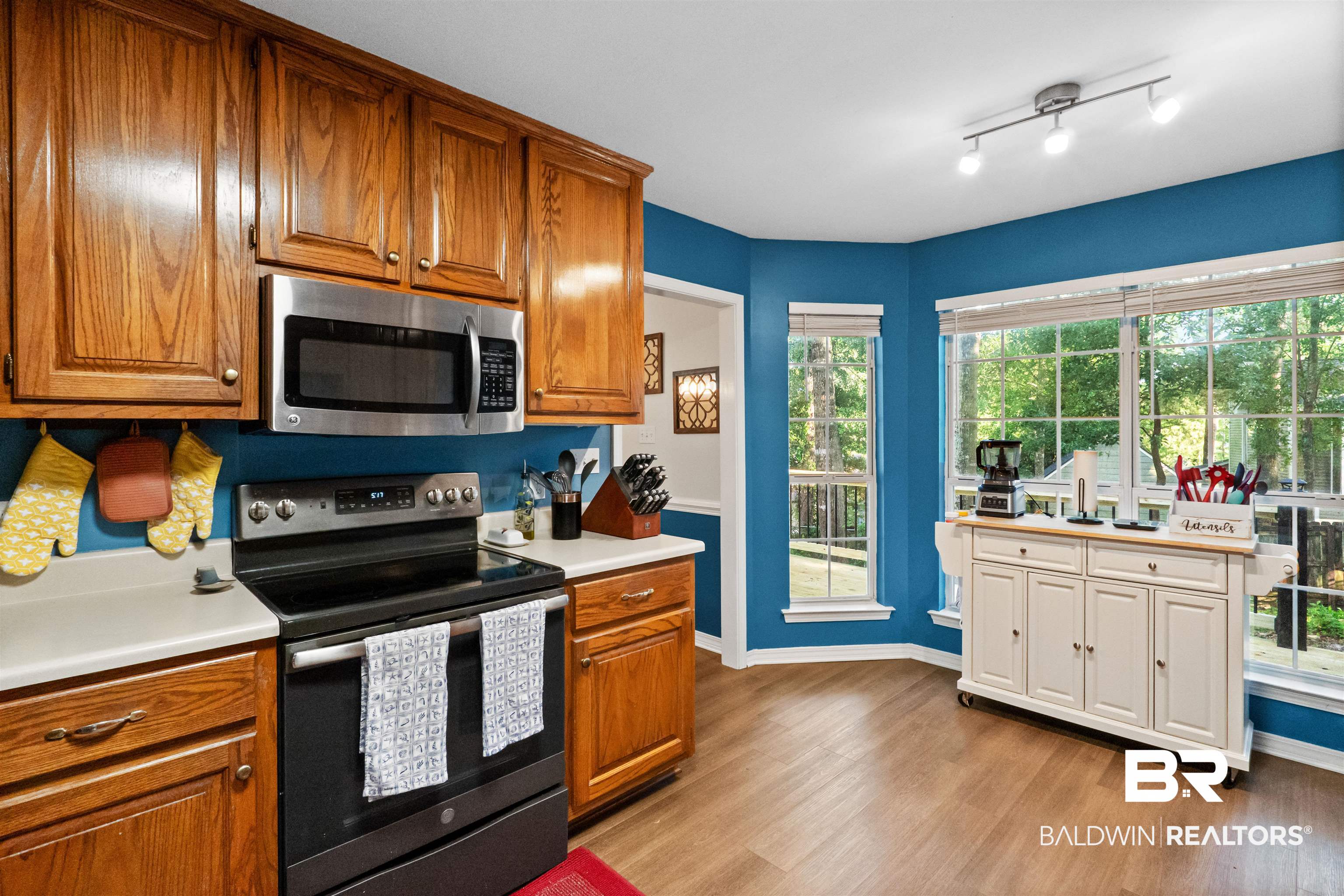 153 Lakeview Loop Daphne, AL 36526 - Photo 21 of 56 Designed for everyday living, the kitchen offers generous workspace, abundant cabinetry, and cheerful natural light throughout the day.