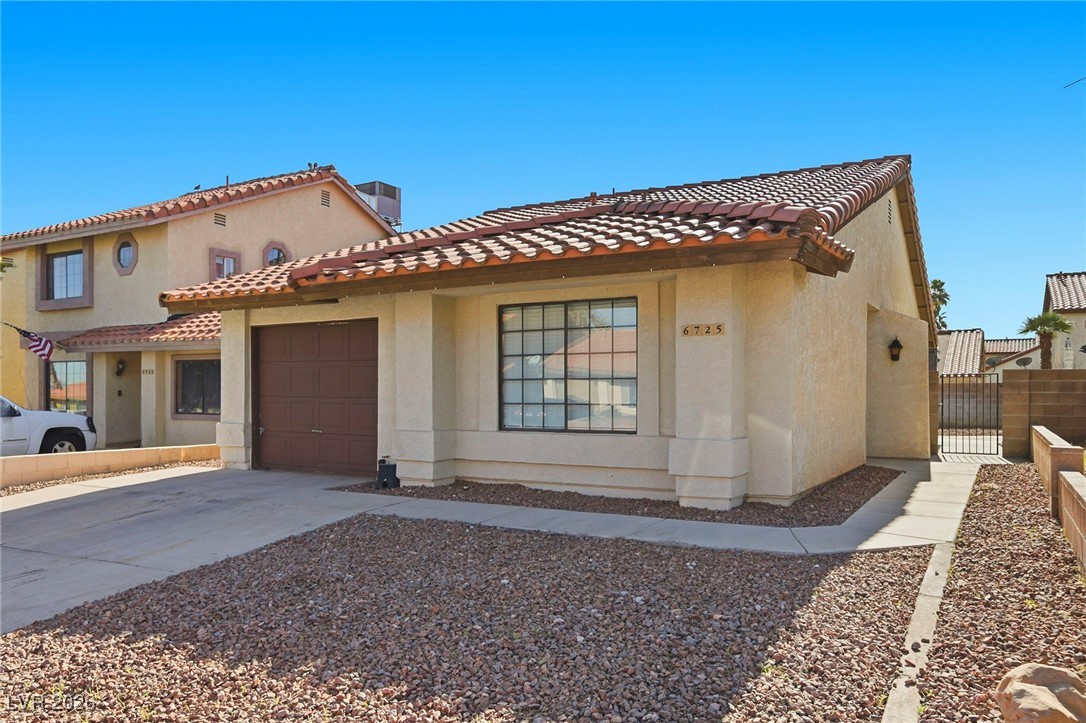6725 Reggie Circle Las Vegas, NV 89107 - Photo 3 of 24