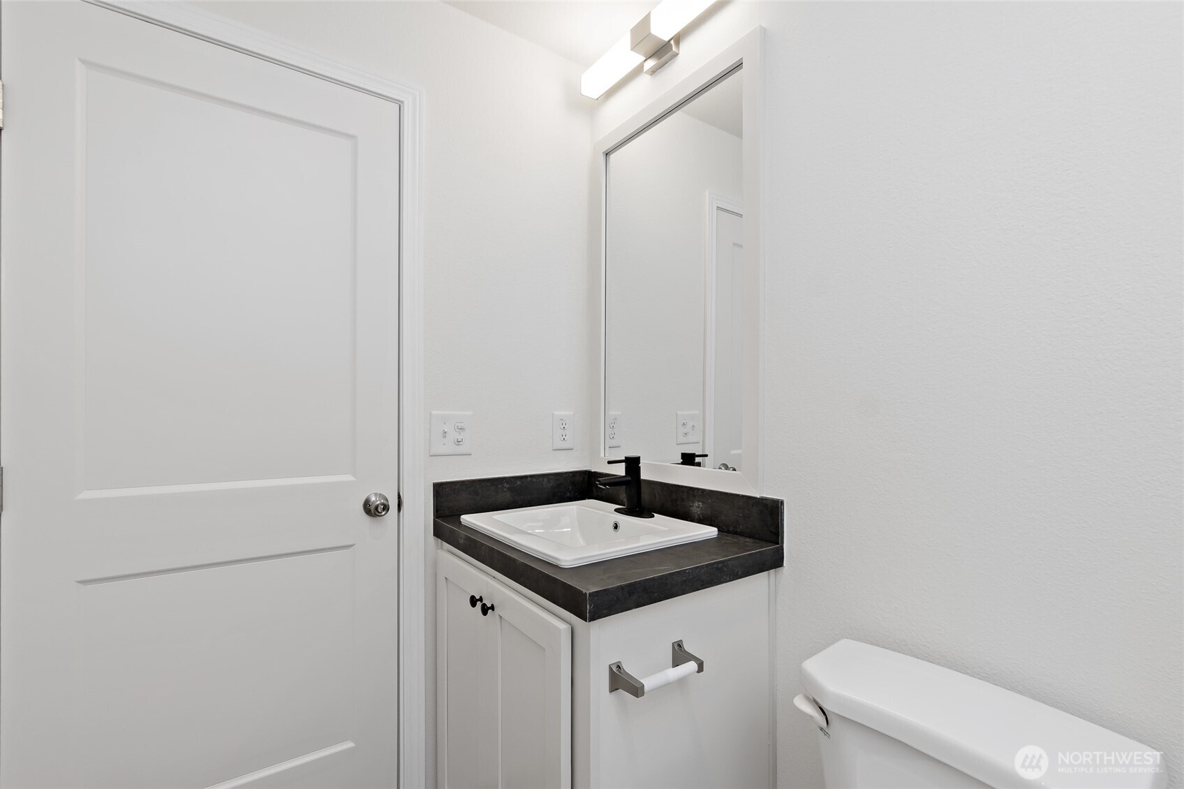 17217 80th Street Southwest Longbranch, WA 98351 - Photo 26 of 39 a bathroom with a sink and a toilet