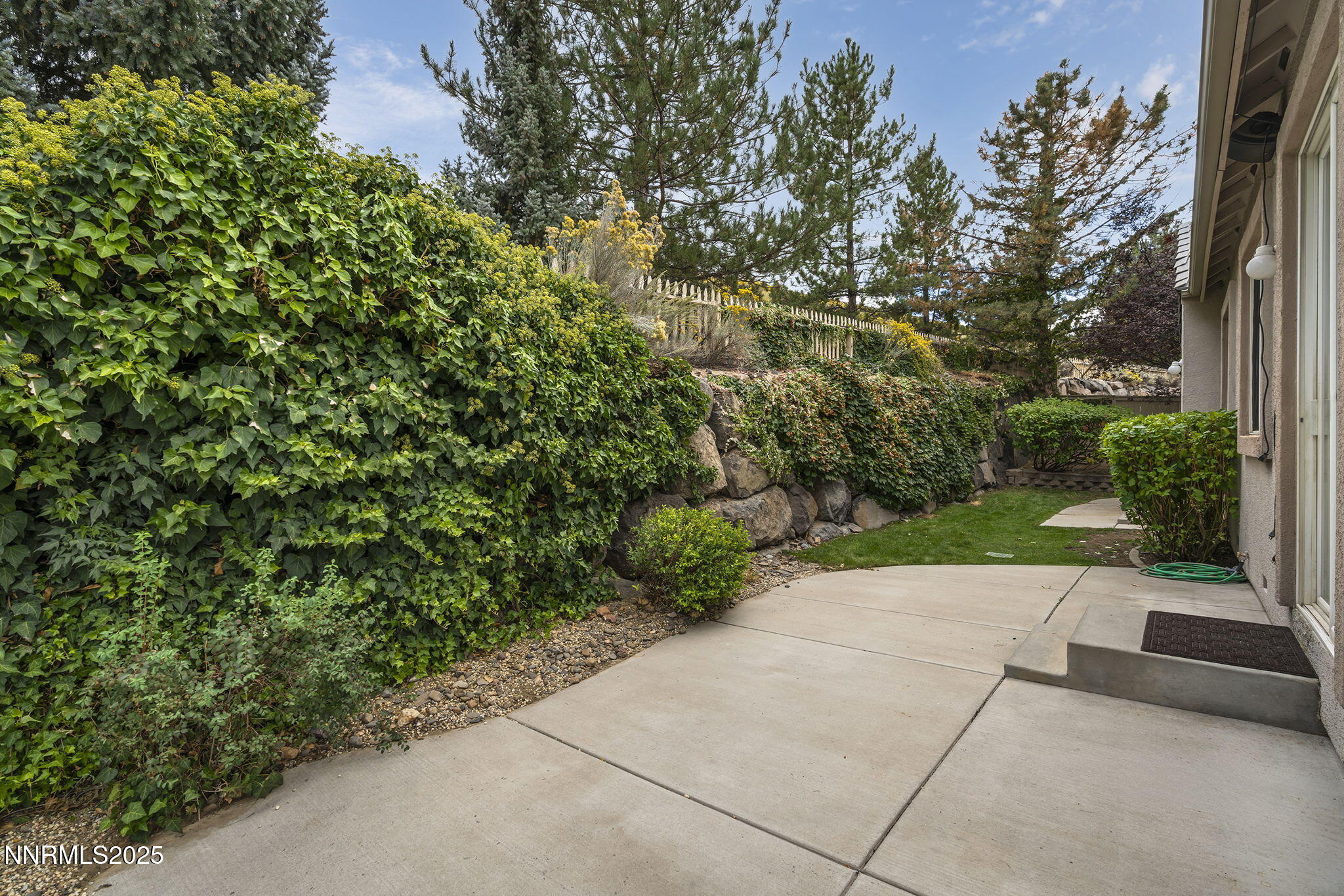 1720 Hunter Creek Road Reno, NV 89519 - Photo 18 of 21 a view of a street with a tree