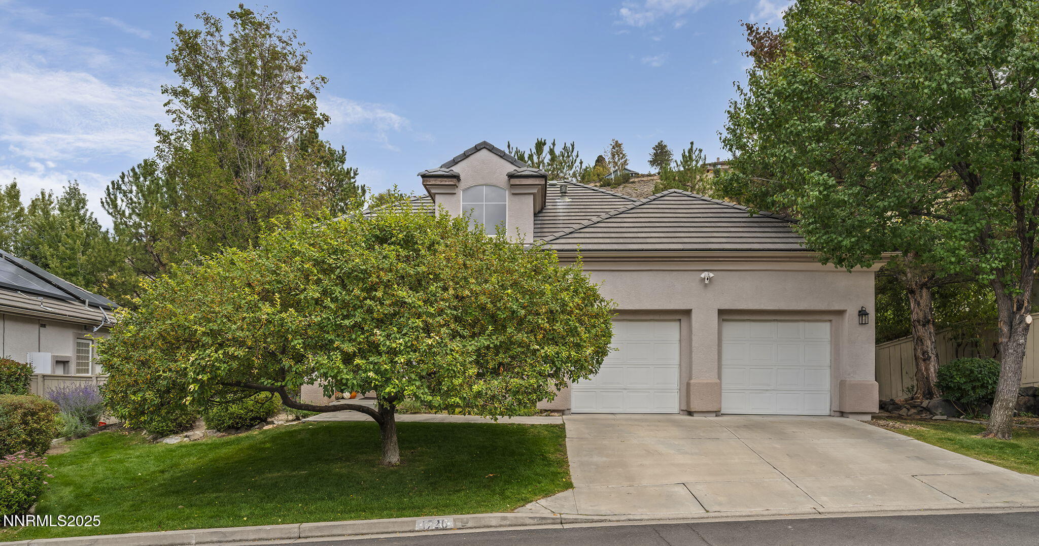 1720 Hunter Creek Road Reno, NV 89519 - Photo 21 of 21 a front view of a house with garden