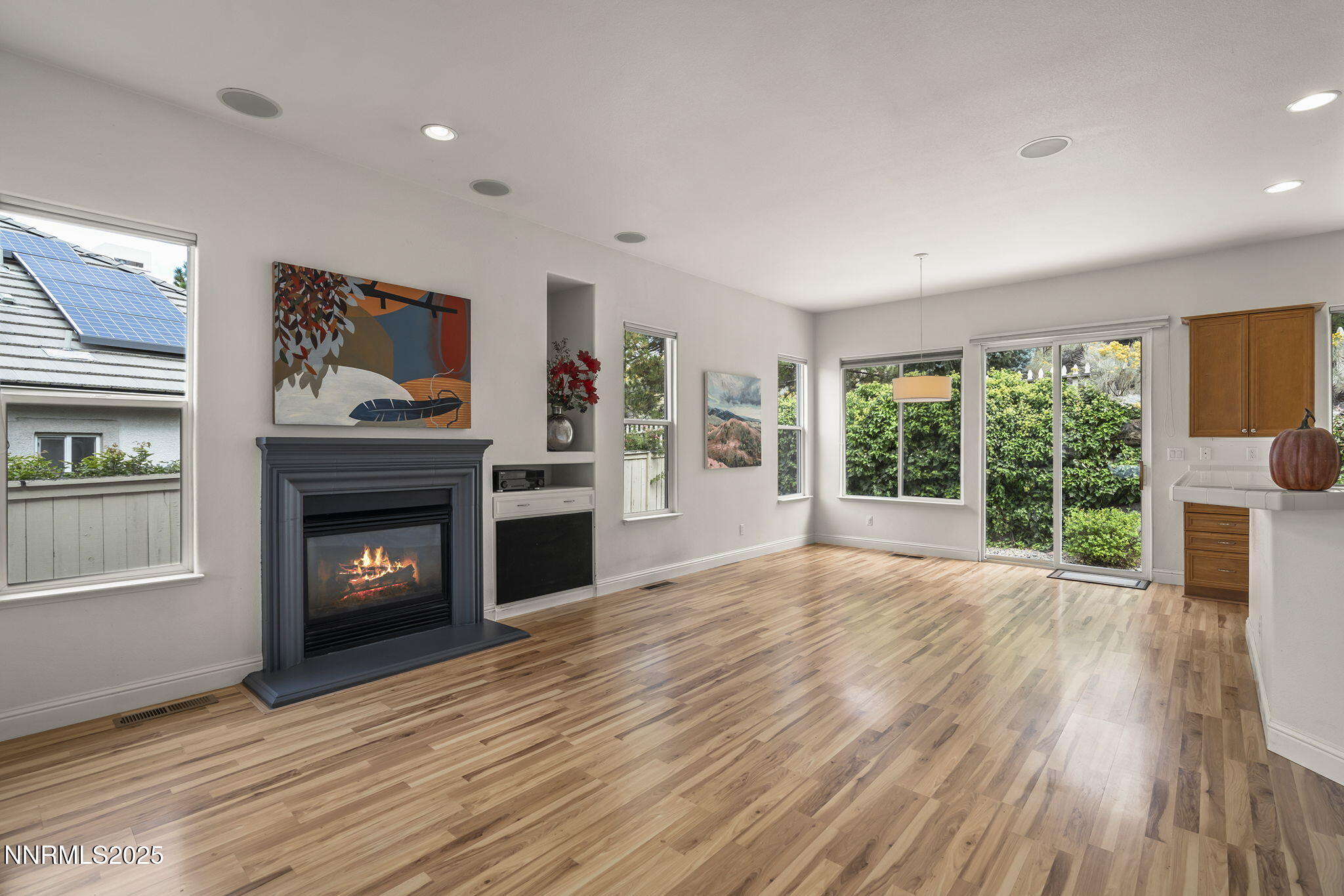 1720 Hunter Creek Road Reno, NV 89519 - Photo 3 of 21 a view of a livingroom with a fireplace and wooden floor