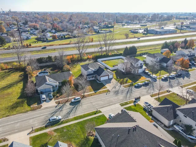 a view of houses with yard