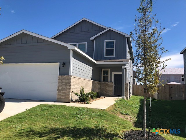 2537 Ayers Drive Seguin, TX 78155 - Photo 1 of 1 a front view of a house with garden