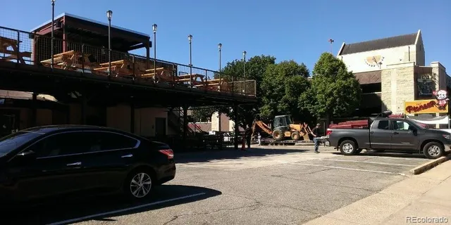 a car parked in front of a building