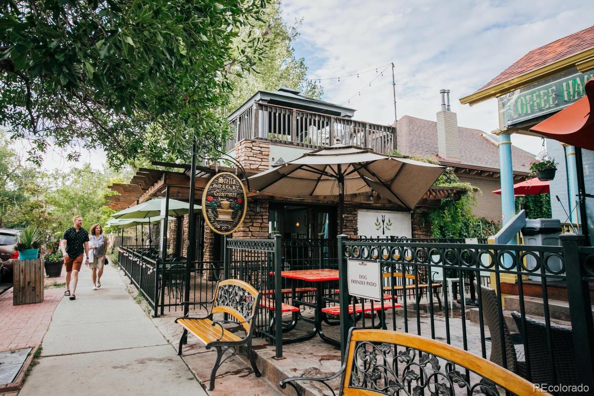2500 South York Street, Unit 401 Denver, CO 80210 - Photo 16 of 18 a view of a cafe with sitting area
