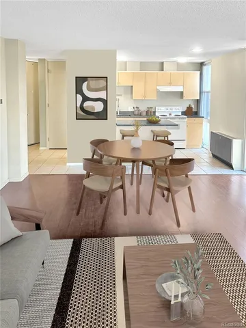 a living room with a couch and a table