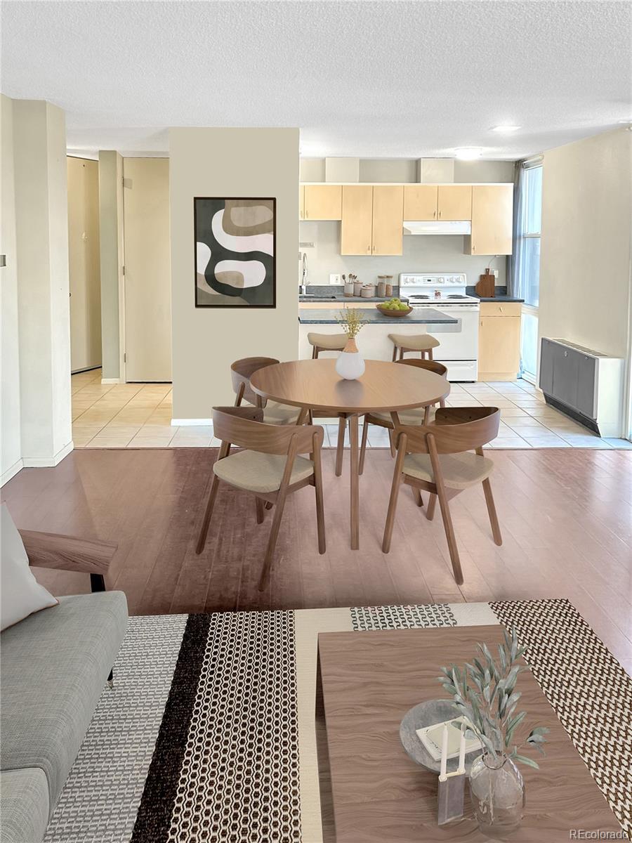 2500 South York Street, Unit 401 Denver, CO 80210 - Photo 6 of 18 a living room with a couch and a table