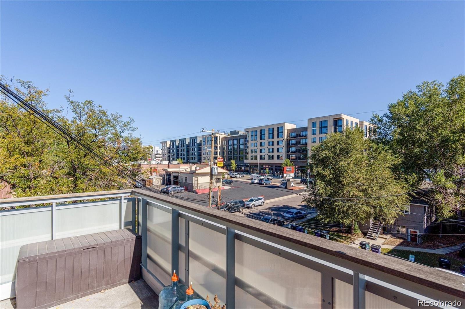 2500 South York Street, Unit 401 Denver, CO 80210 - Photo 9 of 18 a view of a balcony with city view