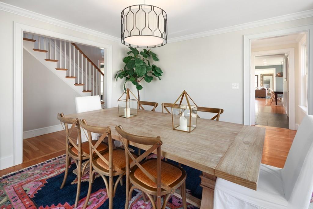73 Winter Street Hingham, MA 02043 - Photo 13 of 42 a view of a dining room with furniture wooden floor and chandelier