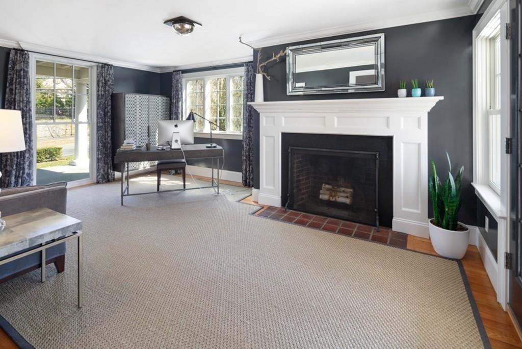 73 Winter Street Hingham, MA 02043 - Photo 14 of 42 a living room with furniture and a fireplace