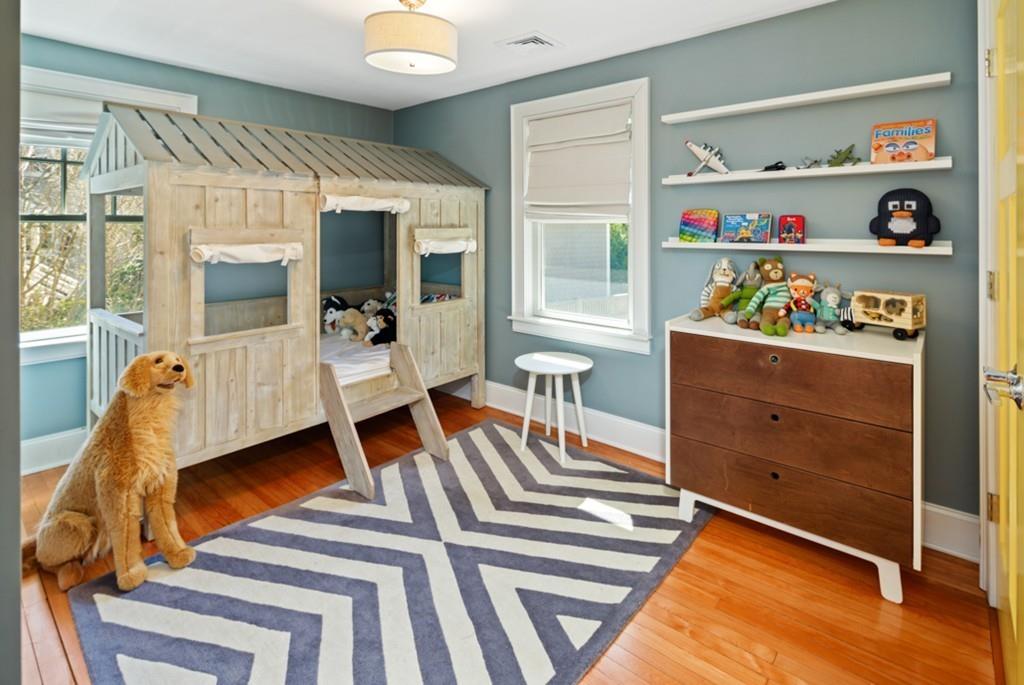 73 Winter Street Hingham, MA 02043 - Photo 29 of 42 a bedroom with furniture and a wooden floor