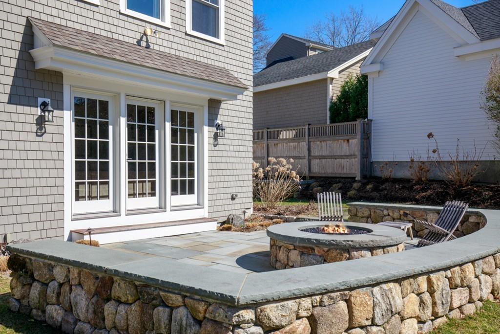 73 Winter Street Hingham, MA 02043 - Photo 33 of 42 a view of a house with backyard and sitting area