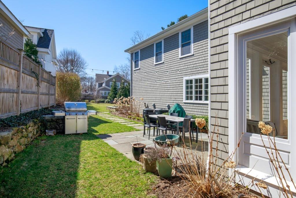73 Winter Street Hingham, MA 02043 - Photo 38 of 42 a view of a backyard with sitting area