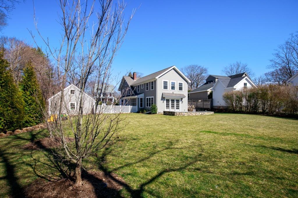 73 Winter Street Hingham, MA 02043 - Photo 39 of 42 a front view of a house with a yard