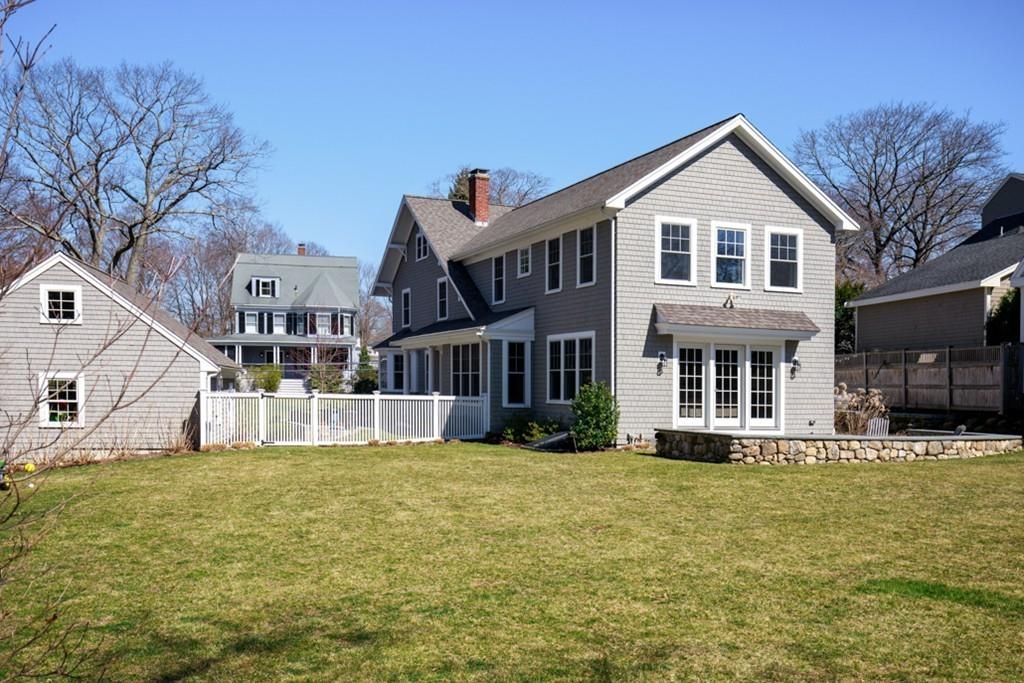 73 Winter Street Hingham, MA 02043 - Photo 40 of 42 a view of a house with a yard