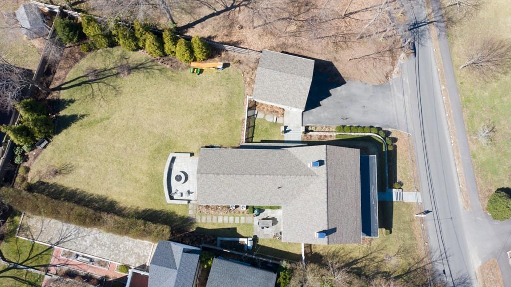 73 Winter Street Hingham, MA 02043 - Photo 41 of 42 a front view of a house with parking area