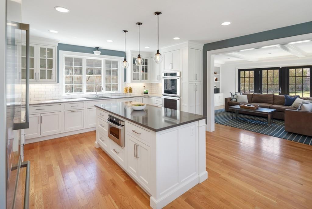 73 Winter Street Hingham, MA 02043 - Photo 7 of 42 a kitchen with stainless steel appliances granite countertop a stove and a wooden floors