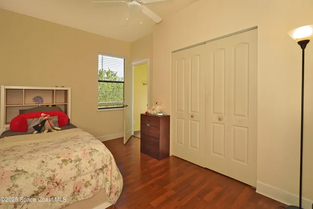 a bathroom with a toilet a sink and shower