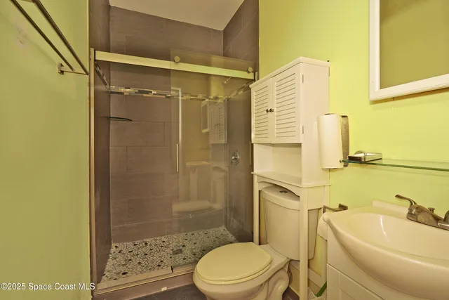 a view of a livingroom with wooden floor