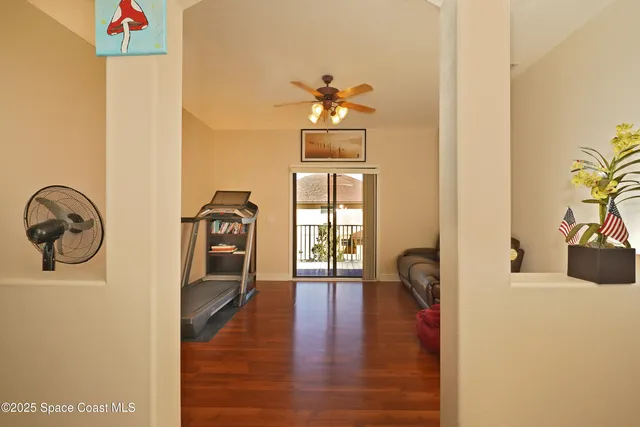 a view of balcony with wooden floor