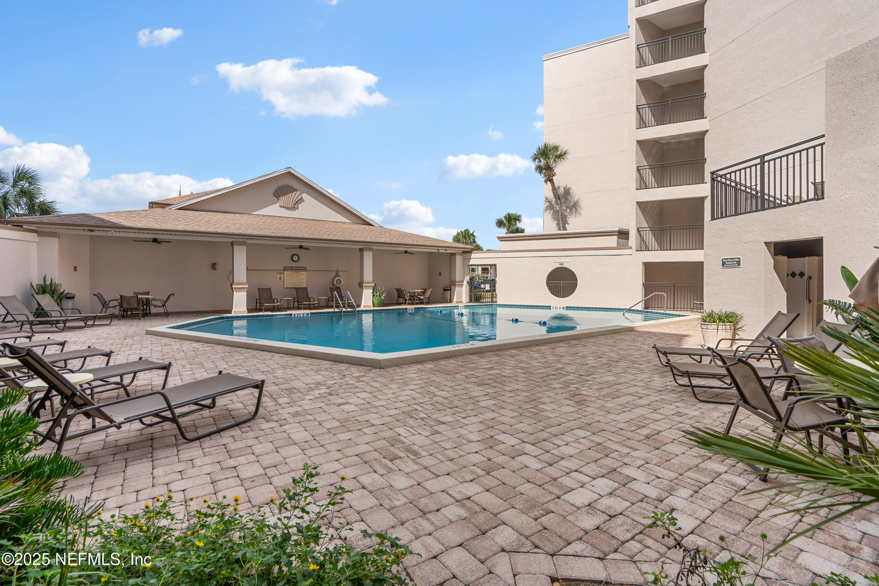 2 Dondanville Road, Unit 207 St. Augustine, FL 32080 - Photo 53 of 65 a view of a house with backyard and sitting area