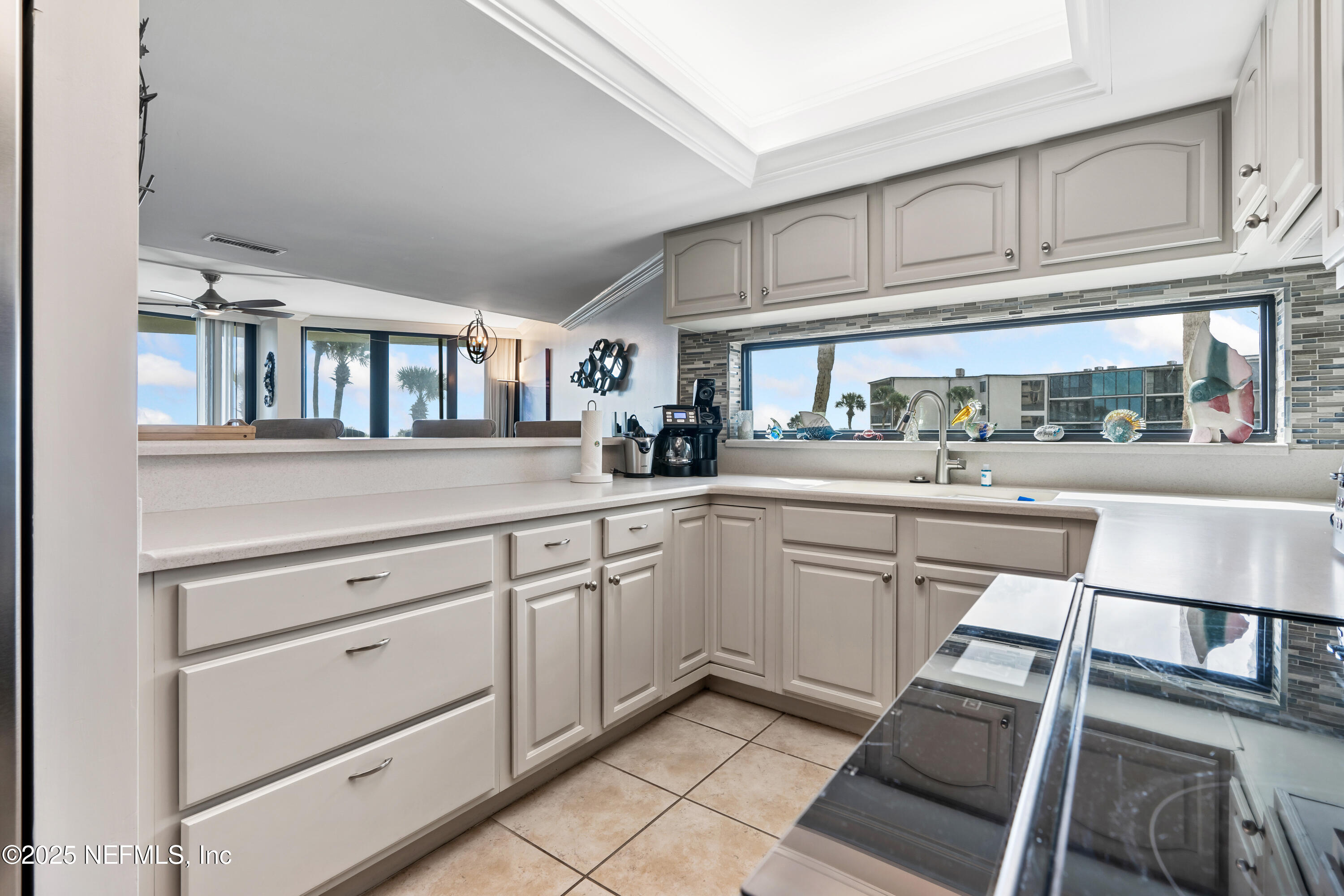 2 Dondanville Road, Unit 207 St. Augustine, FL 32080 - Photo 10 of 65 a kitchen with cabinets and appliances