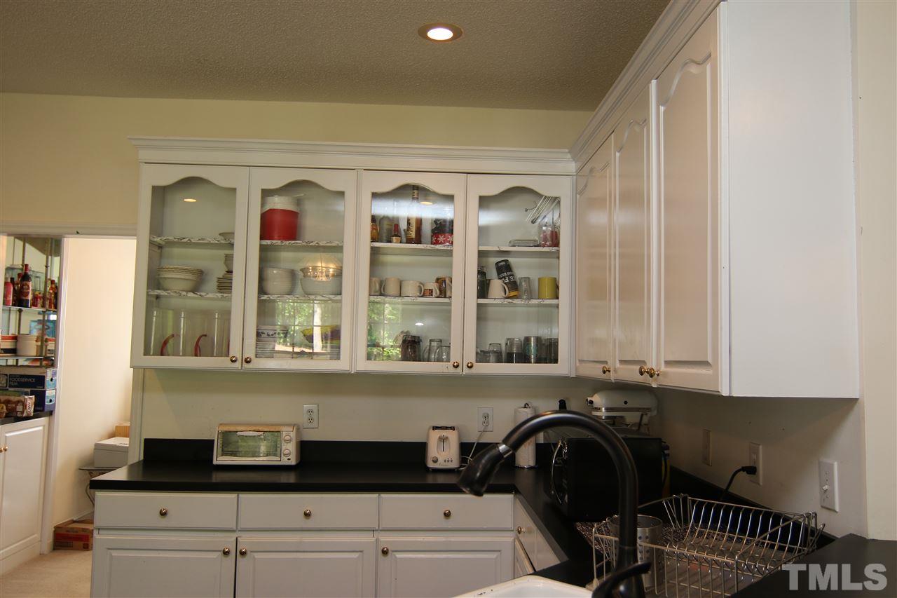 420 Quail Road Smithfield, NC 27577 - Photo 14 of 24 Features Glass Front Cabinets