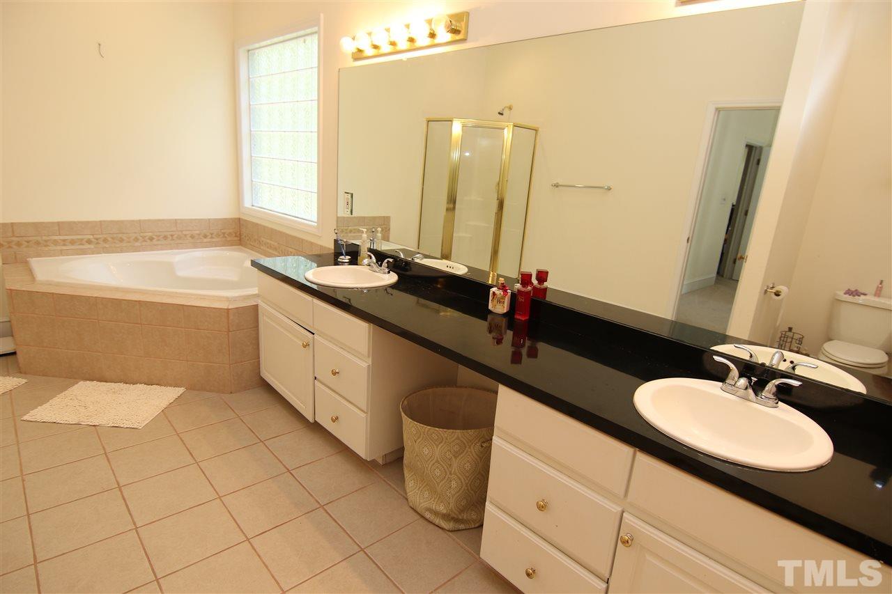 420 Quail Road Smithfield, NC 27577 - Photo 19 of 24 Master Bath features Dual Vanities and Separate Shower