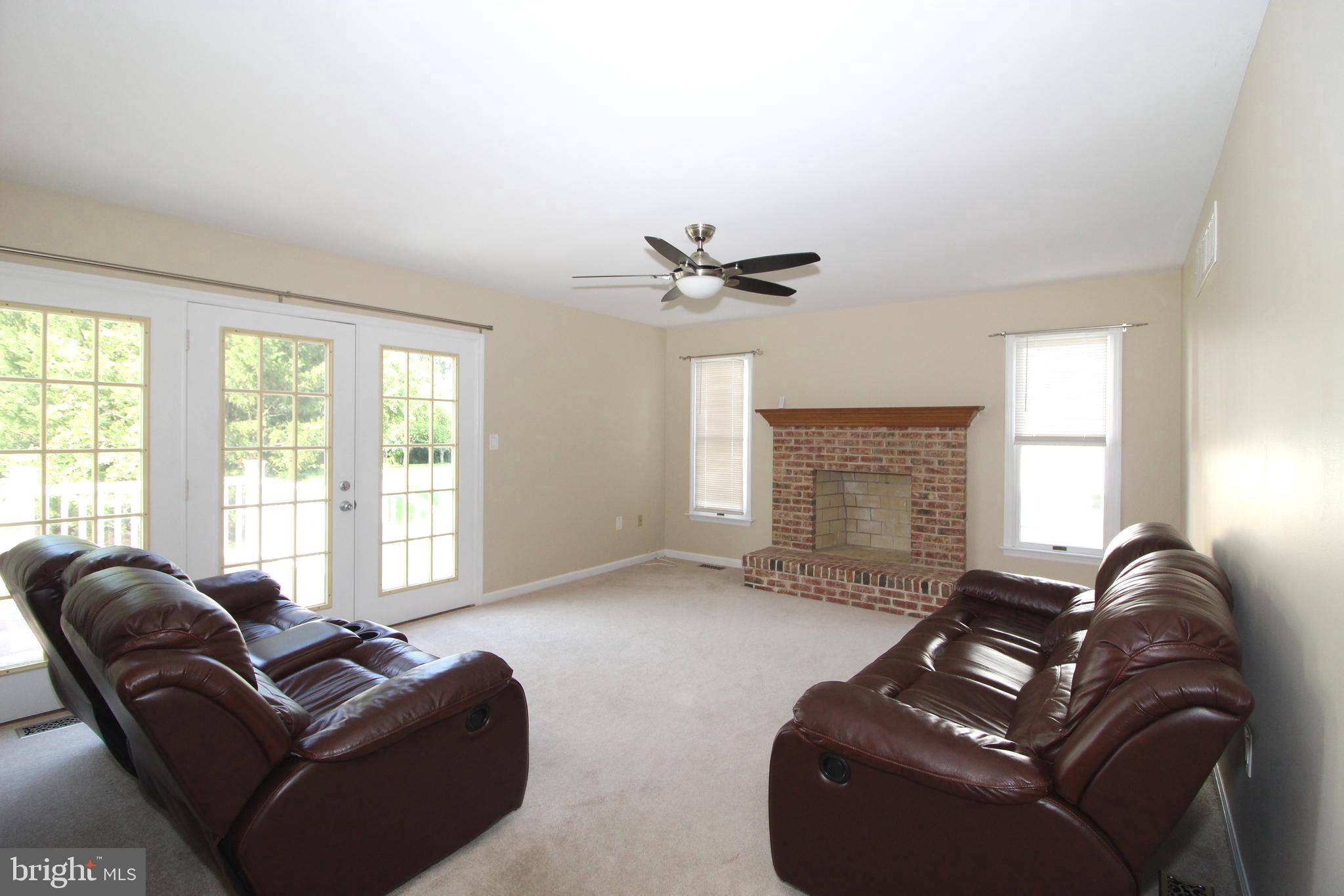 3831 Rotherfield Lane Chadds Ford, PA 19317 - Photo 17 of 43 FR with Brick Fireplace & Access to the New Deck