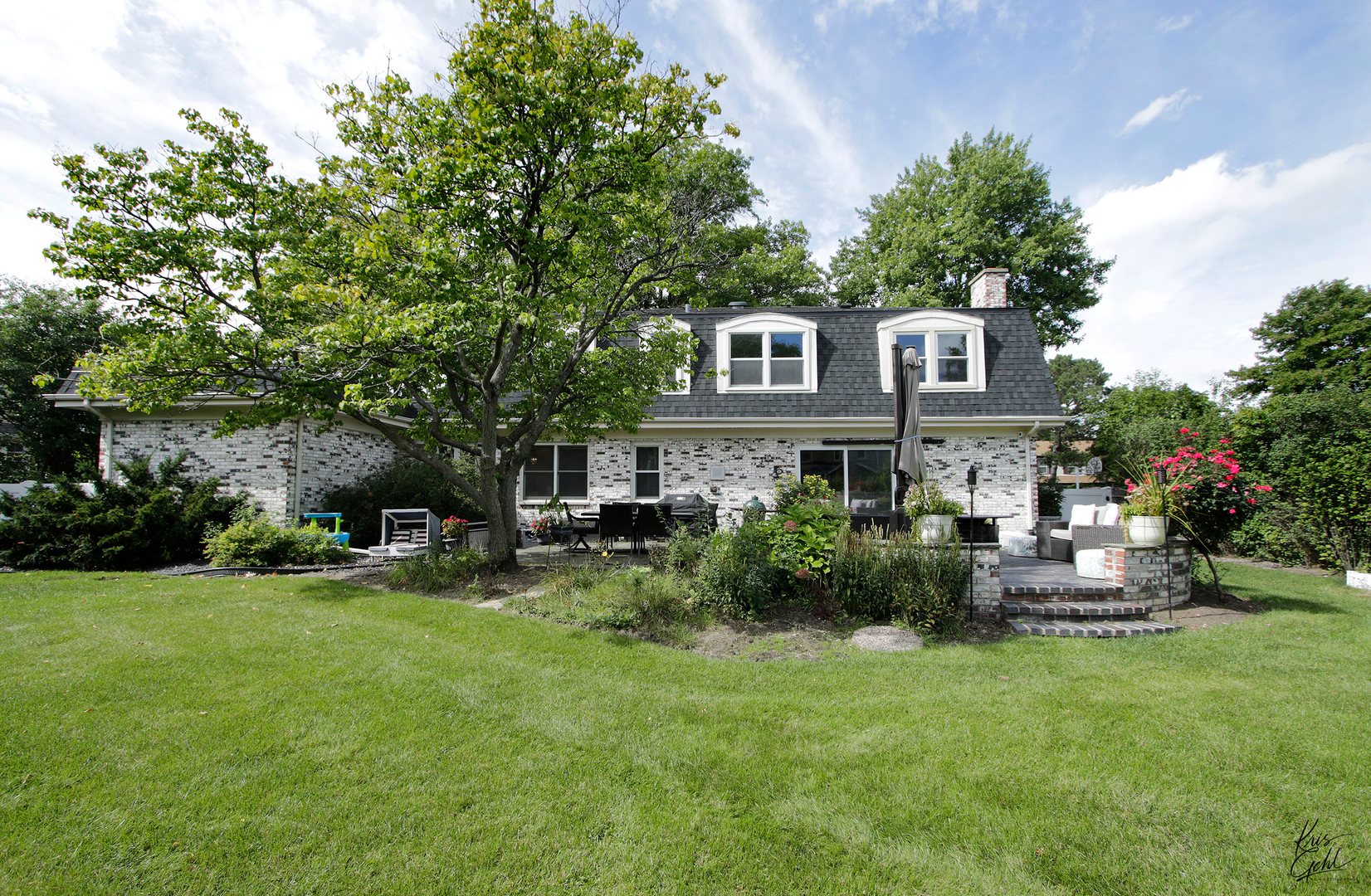 2143 Valley Road Northbrook, IL 60062 - Photo 26 of 26 a front view of a house with a garden