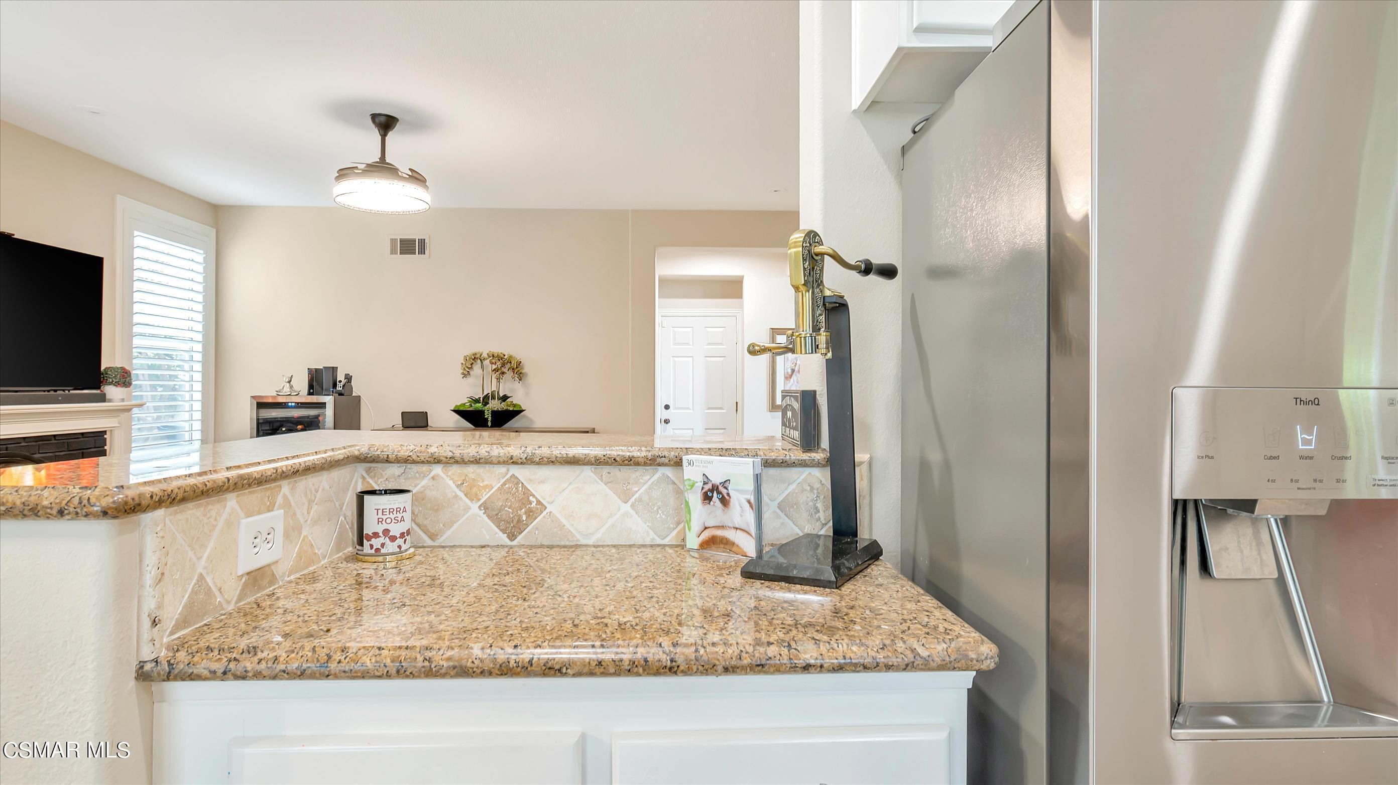 11695 Sagewood Drive Moorpark, CA 93021 - Photo 16 of 31 a bathroom with a granite countertop sink and a mirror or bathtub
