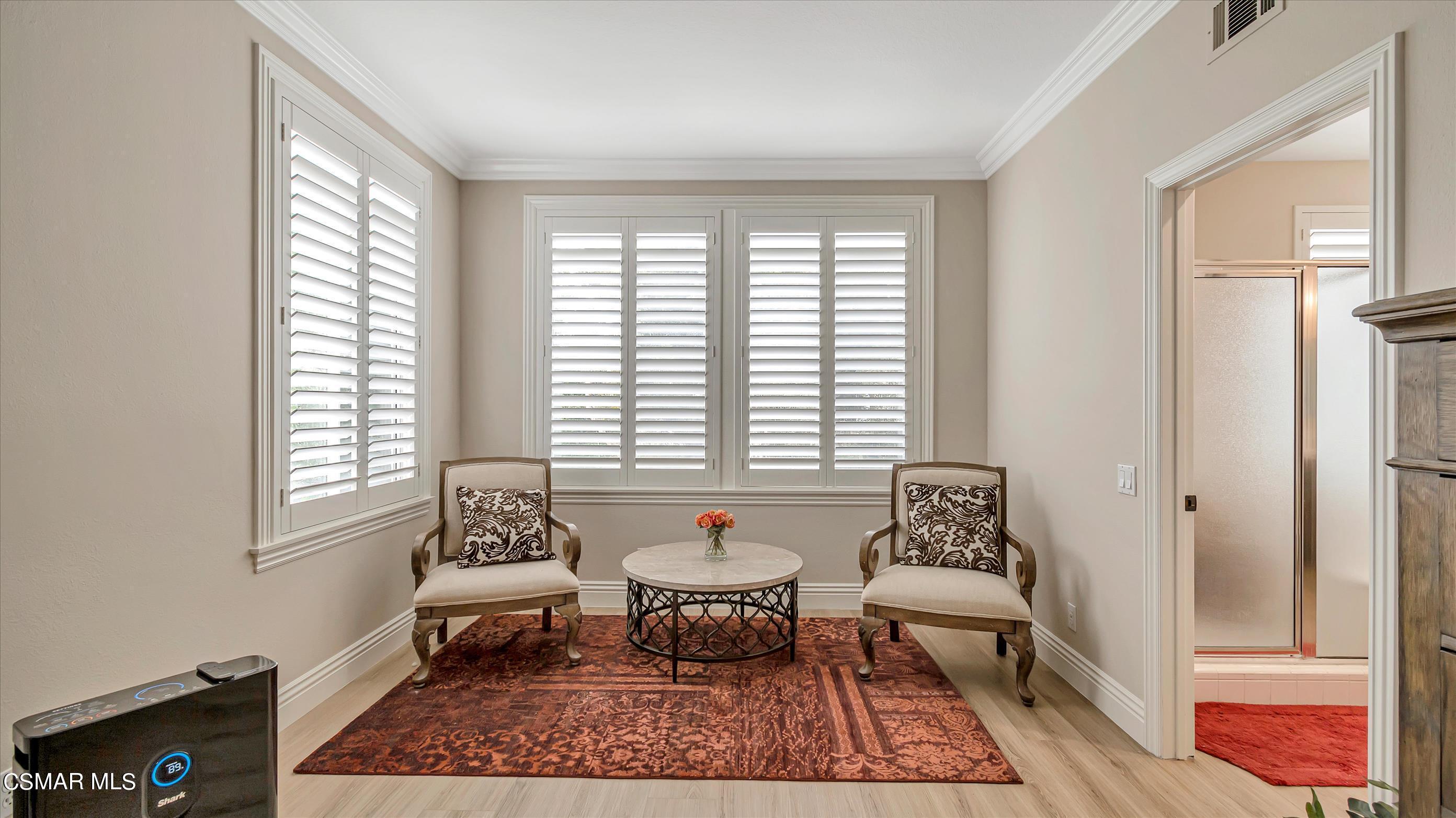 11695 Sagewood Drive Moorpark, CA 93021 - Photo 22 of 31 a living room with furniture and a window