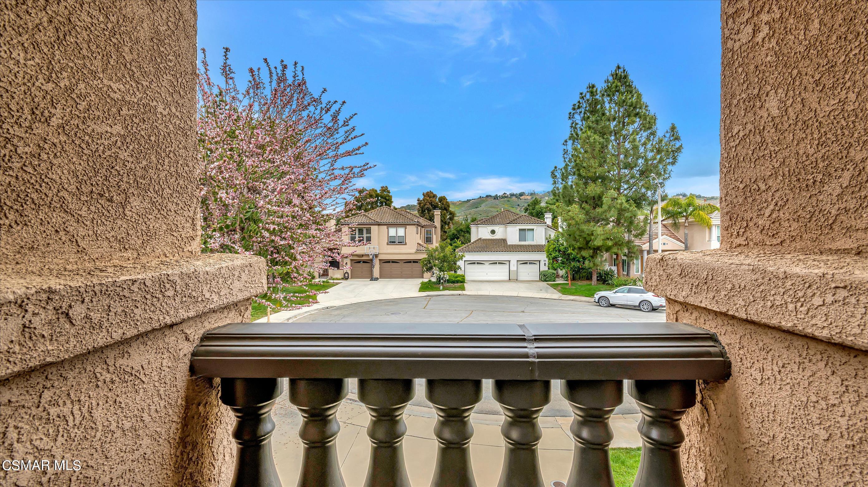 11695 Sagewood Drive Moorpark, CA 93021 - Photo 26 of 31 a view of a dinning table and chairs in patio