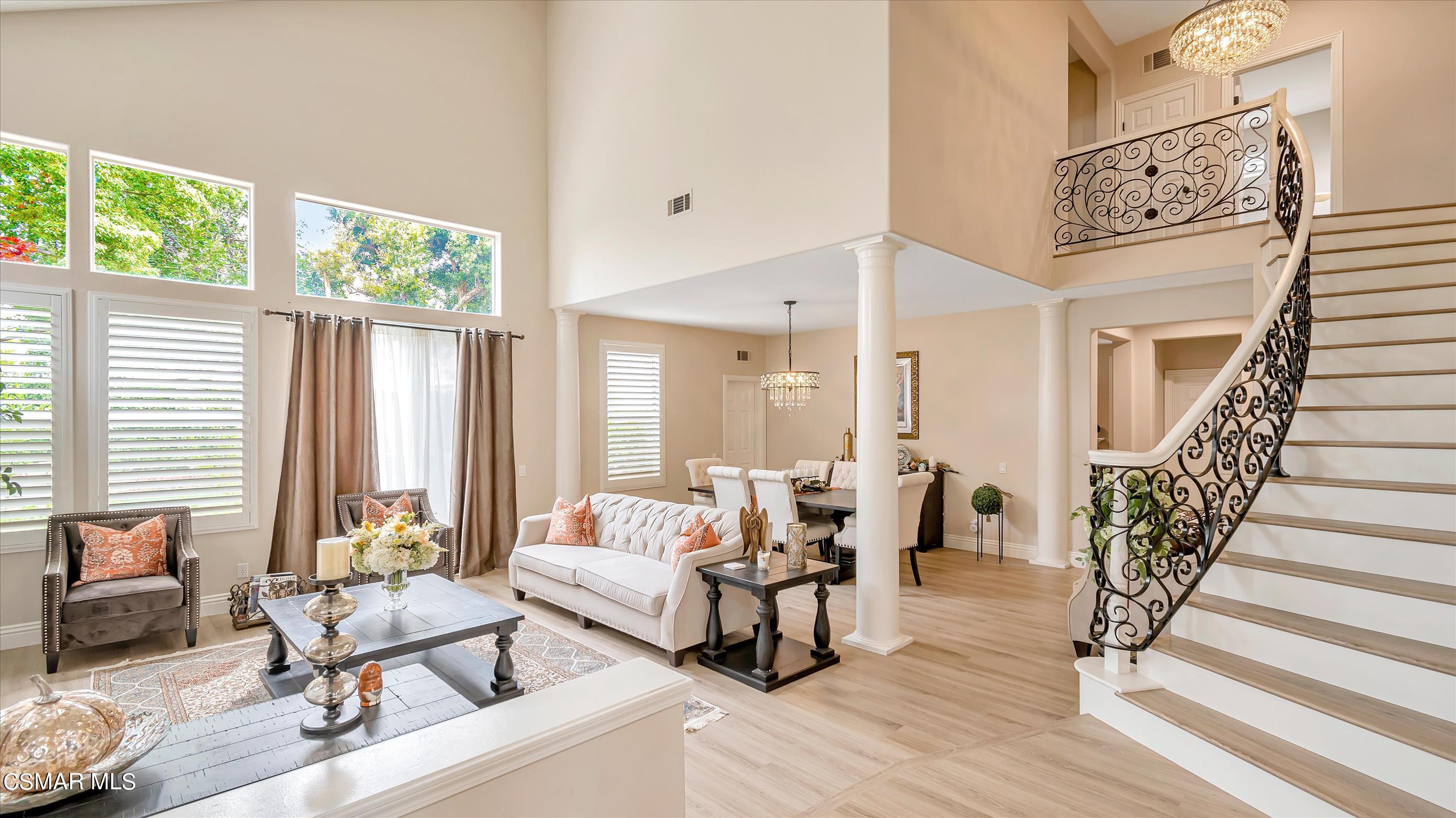 11695 Sagewood Drive Moorpark, CA 93021 - Photo 6 of 31 a living room with furniture and wooden floor