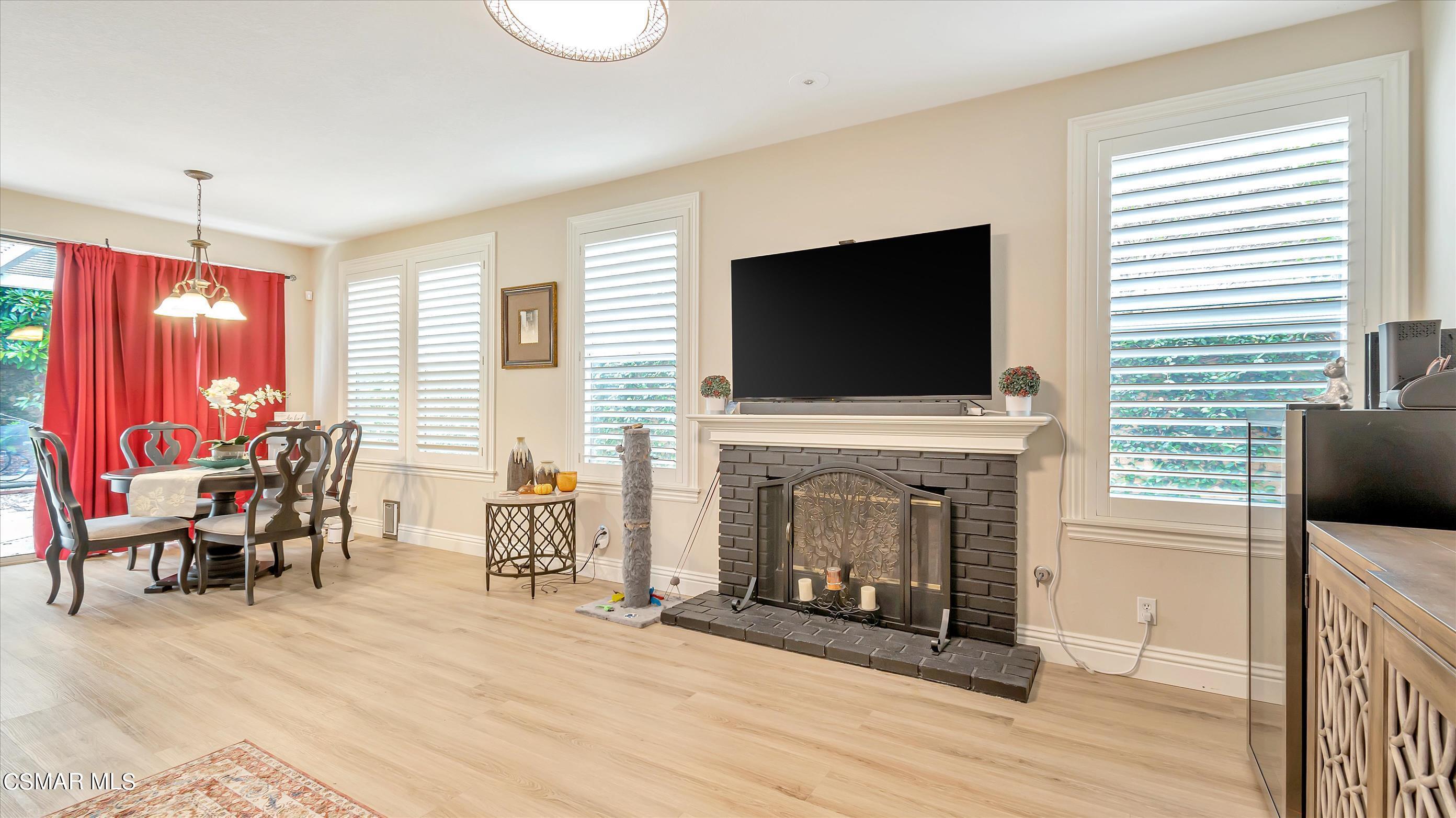 11695 Sagewood Drive Moorpark, CA 93021 - Photo 10 of 31 a living room with furniture and a flat screen tv