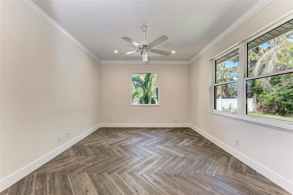 51 Webb Street Osprey, FL 34229 - Photo 32 of 56 wooden floor in an empty room with a window