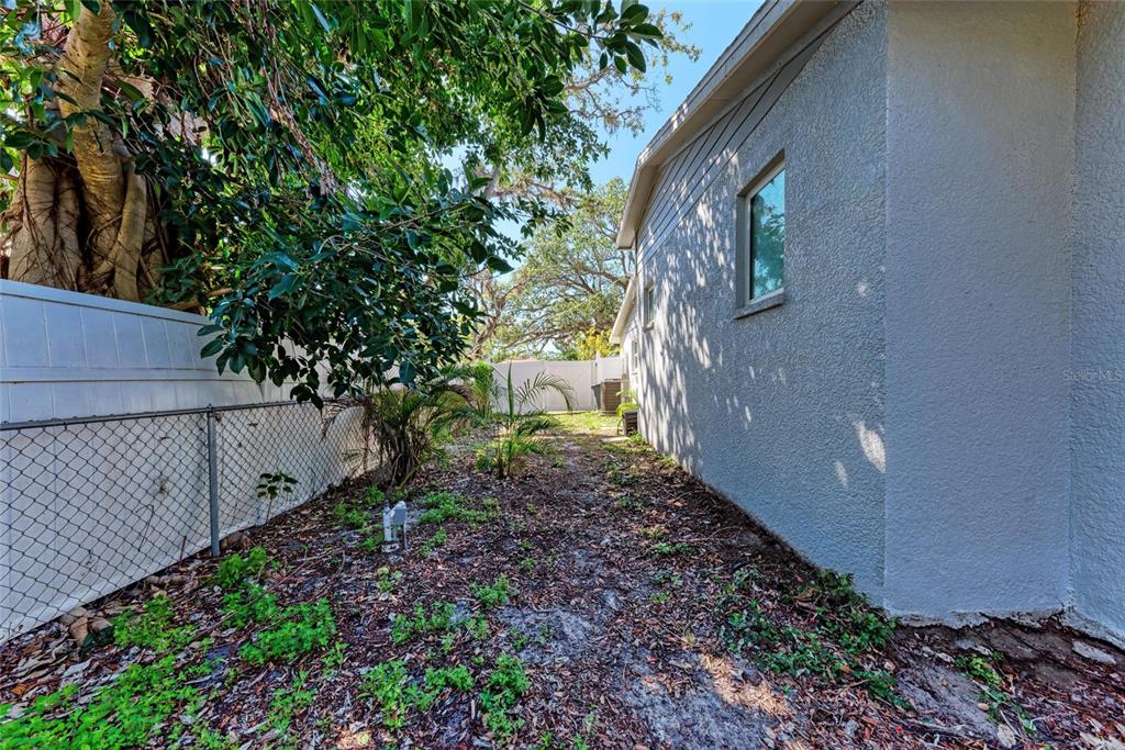 51 Webb Street Osprey, FL 34229 - Photo 52 of 56 a house view with a garden space
