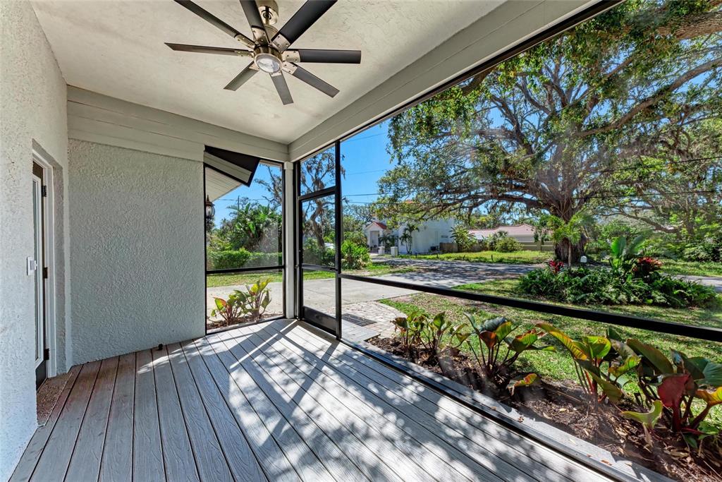 51 Webb Street Osprey, FL 34229 - Photo 7 of 56 a view of a porch and wooden floor