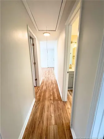 a view of wooden floor in a bathroom