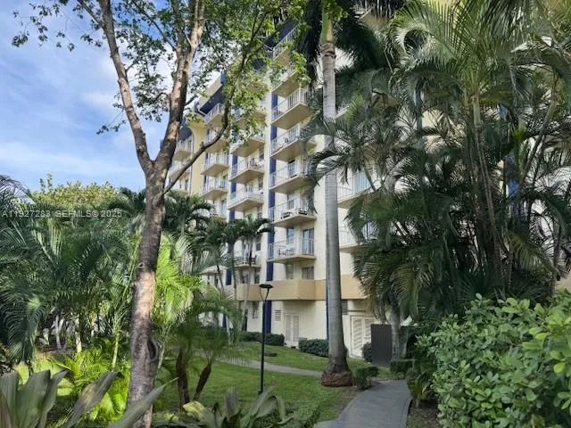 a view of a garden with potted plants