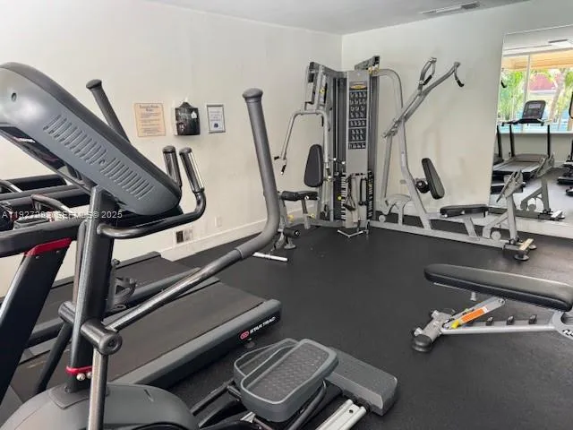 a view of a swimming pool with a yard