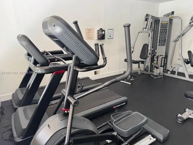 a view of a swimming pool with a yard